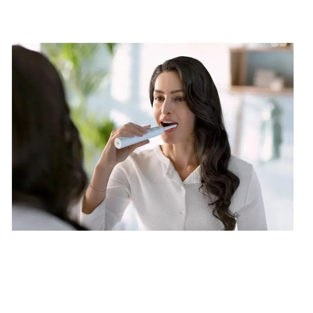 Электрическая зубная щетка Philips Sonicare Series 1100 (белый/зеленый)